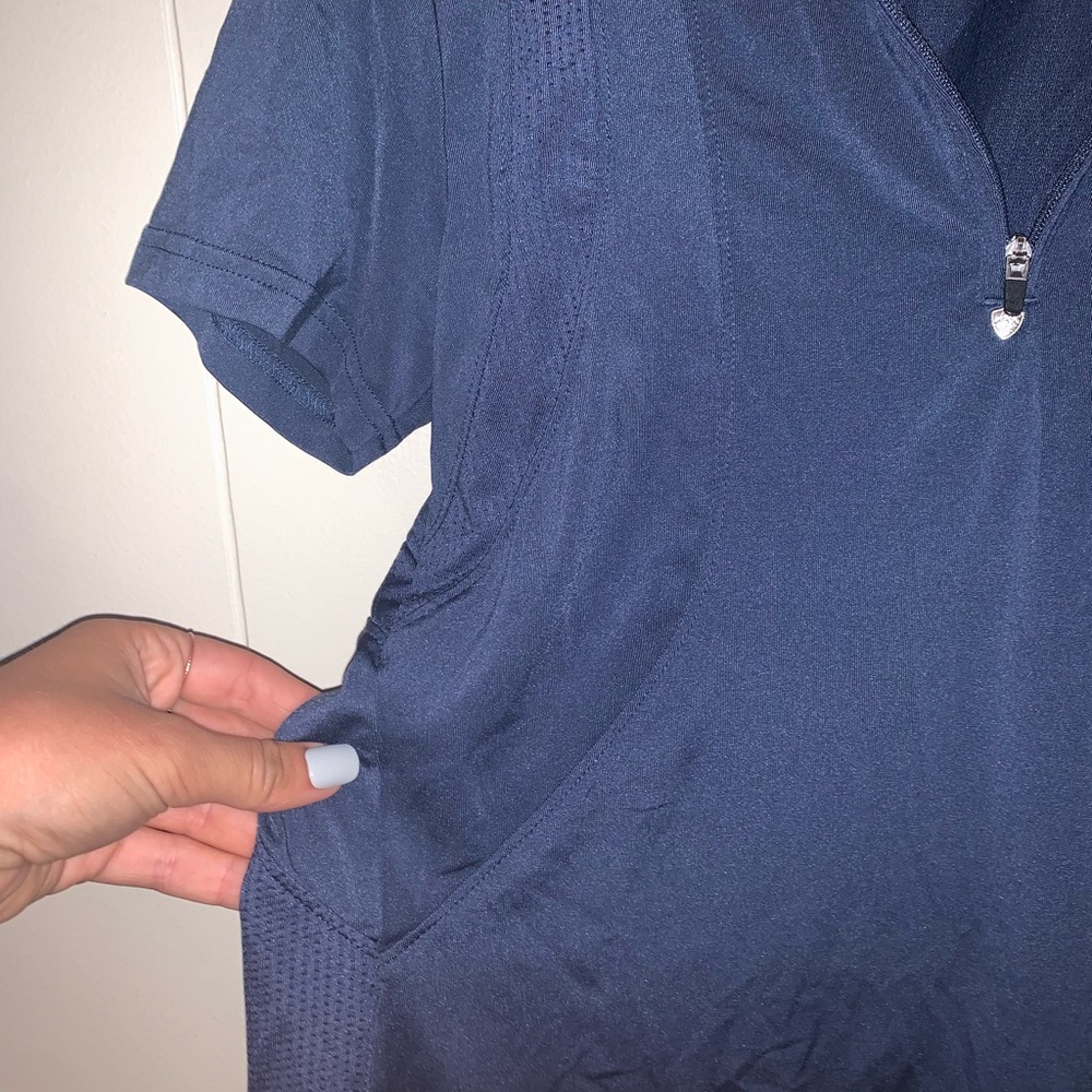 Arita riding top